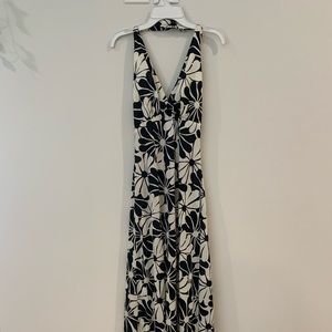 I couldn’t find a brand, but it is a great summer dress. Price negotiable